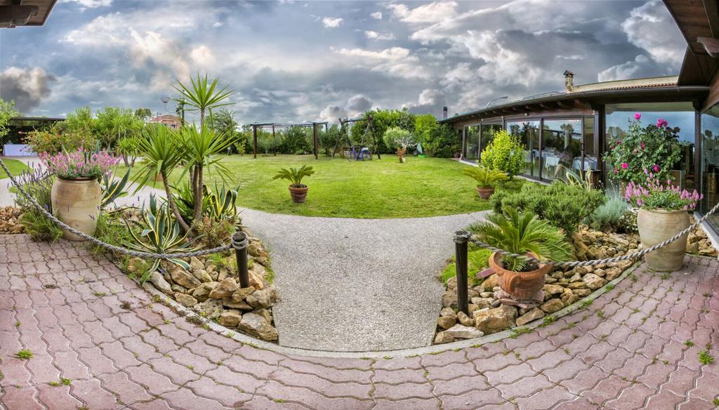 Agriturismo Torre Flavia ลาดิสโปลี ภายนอก รูปภาพ