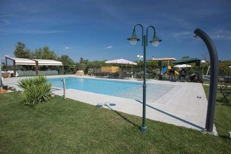 Agriturismo Torre Flavia ลาดิสโปลี ภายนอก รูปภาพ